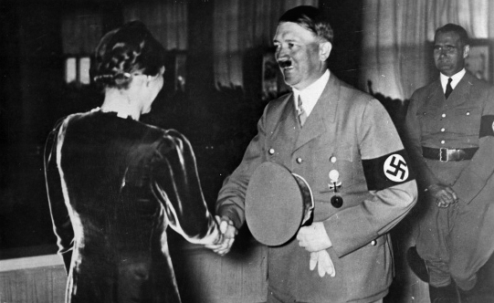 Adolf Hitler greets Gertrud Scholtz-Klink, leader of the National Socialist Women's League (NS-Frauenschaft)